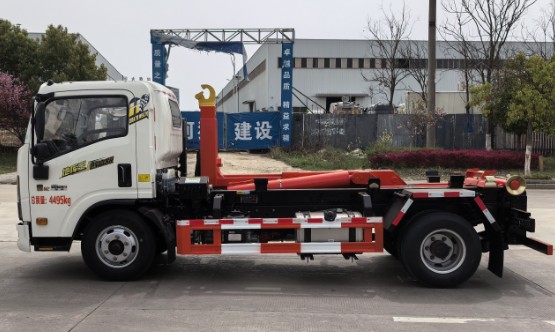 下地下室的重汽豪沃蓝牌勾臂垃圾车_楚胜牌CSC5049ZXXZ6型车厢可卸式垃圾车