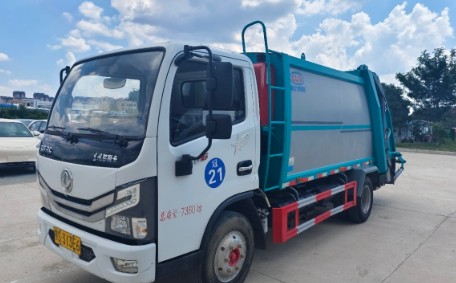二手东风多利卡7方压缩垃圾车_二手9成新程力7方压缩垃圾车