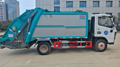 二手东风多利卡7方压缩垃圾车_二手9成新程力7方压缩垃圾车